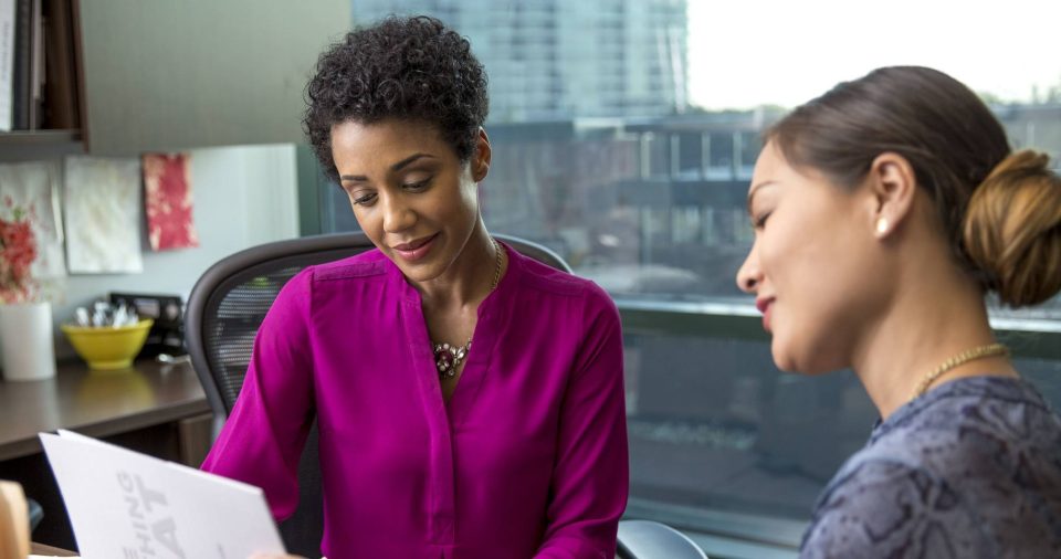 two women in a meeting
