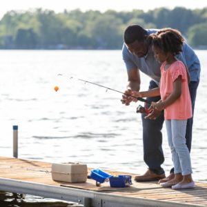 man and child fishing