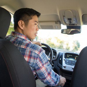 Man test driving car