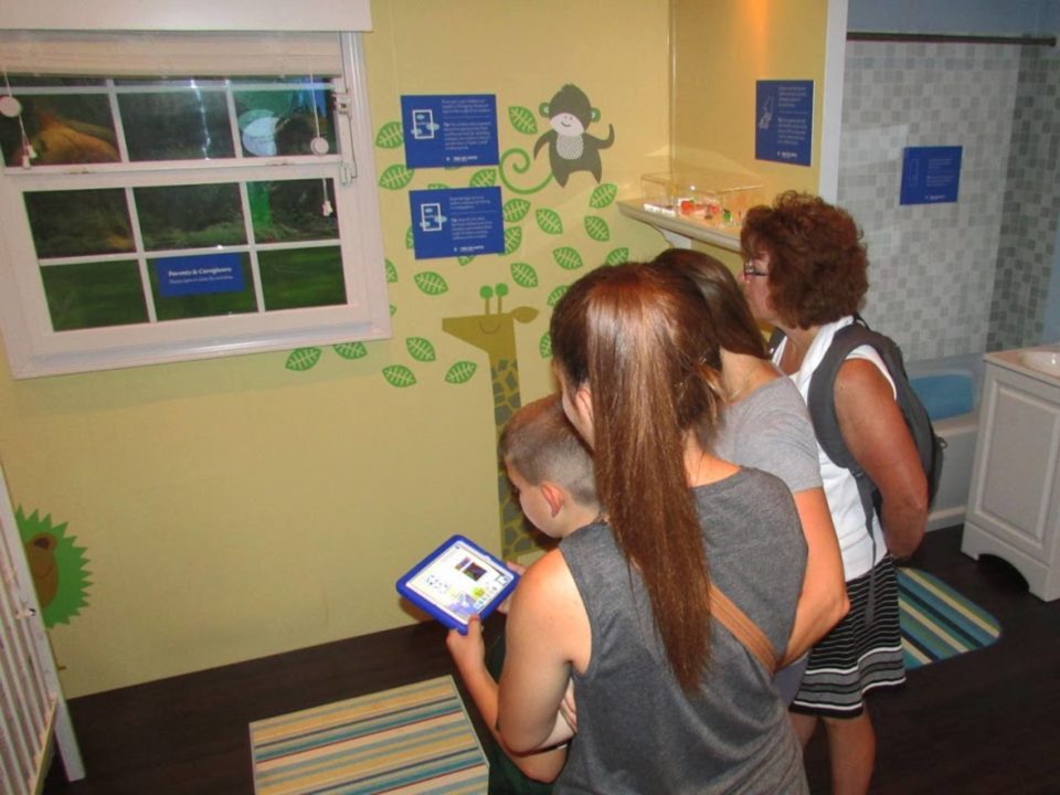 Visitors to The Great New York State Fair learn about cord and blind safety – just one of the interactive stations inside the Make Safe Happen Safety Experience.