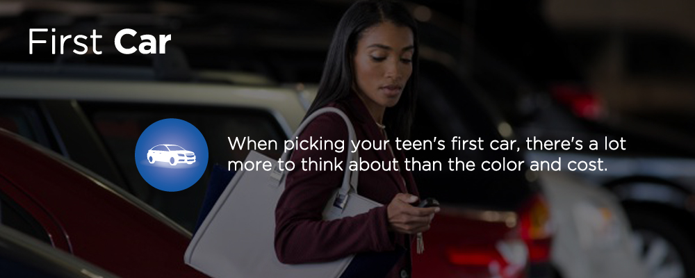 woman holding purse while pressing her car key fob