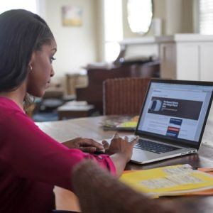 woman sitting at computer