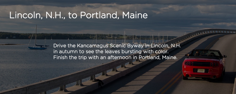 a car driving on a road with text 'Lincoln, NH to Portland, Maine'