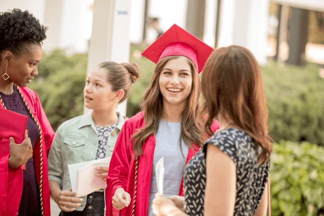 college students in caps and gowns