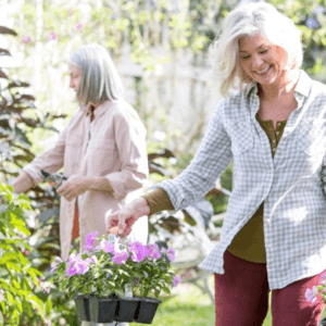 women planting in garden