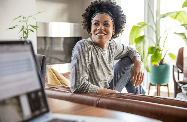 woman sitting at home working