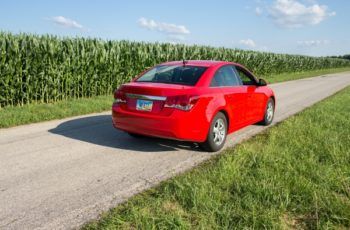 red car on a road