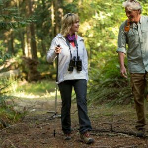 two people hiking in a park