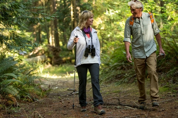 two people hiking in a park