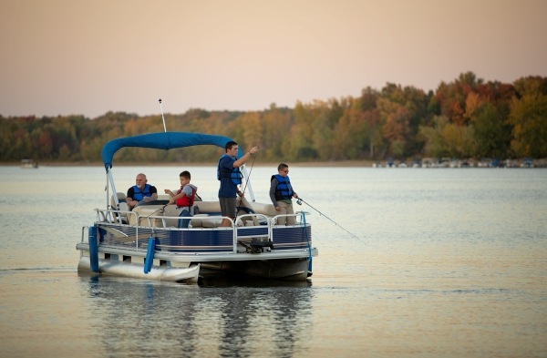 People fishing from a pontoon boat