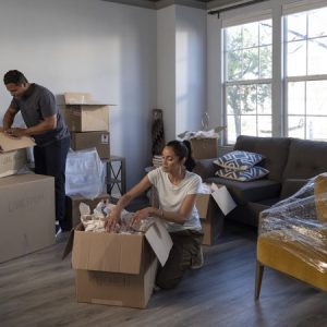 Couple Unpacking From Moving