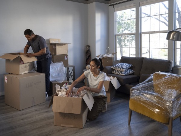 Couple Unpacking From Moving