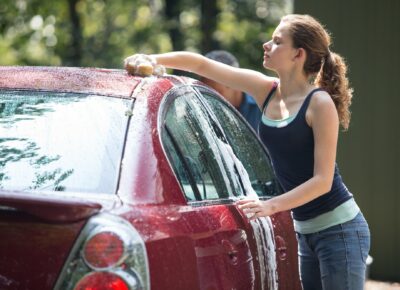 Girl washing car