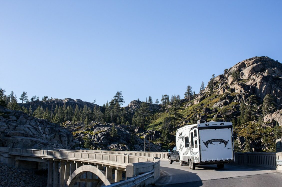 RV driving over a bridge