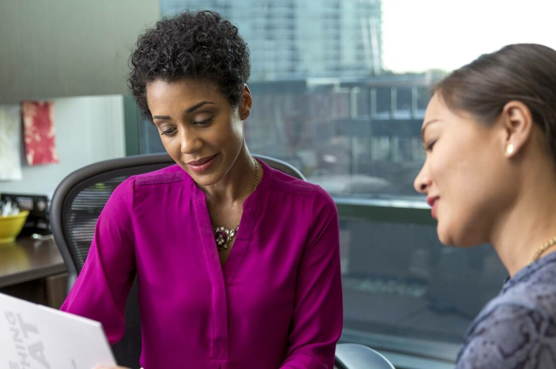 two women in a meeting