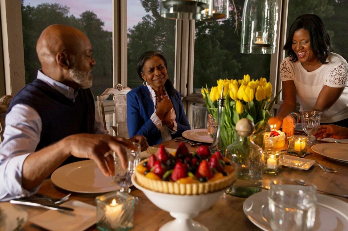 a family sitting around a dinner table