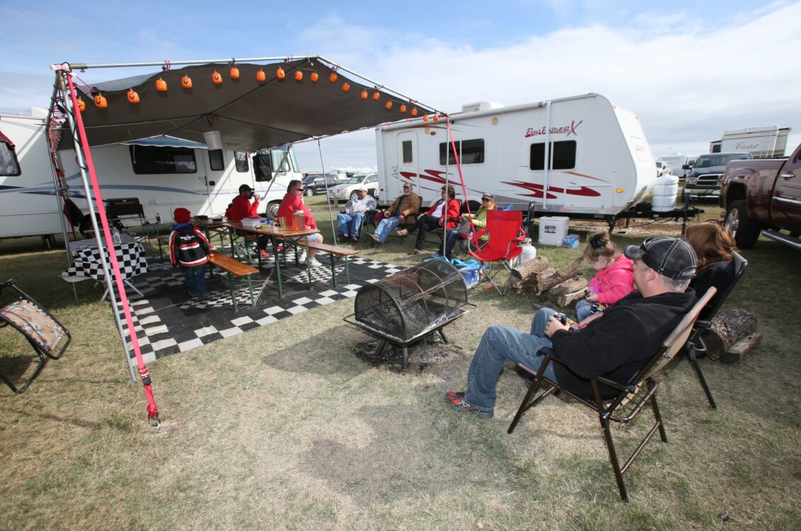 a group of people having a barbecue