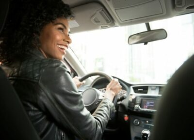 a woman driving a car