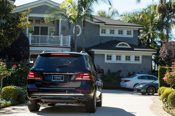 A car braking as it pulls into a driveway.