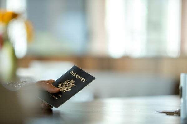 Hand holding passport