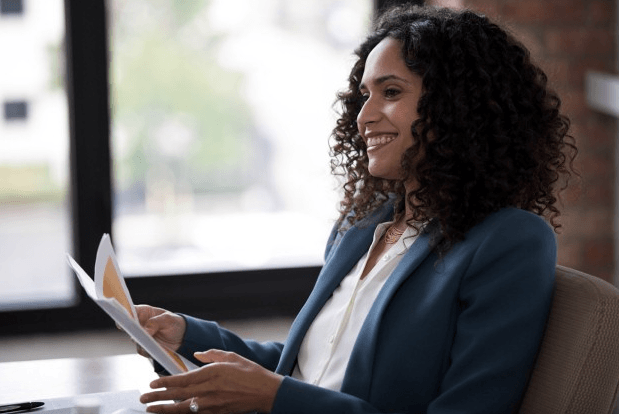 businesswoman holding paperwork