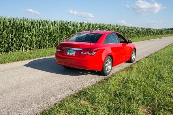 red car on a road, Auto Insurance