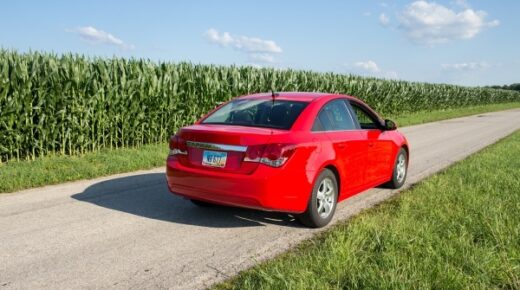 red car on a road