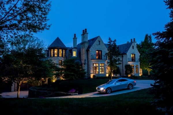 A house with lights on at night