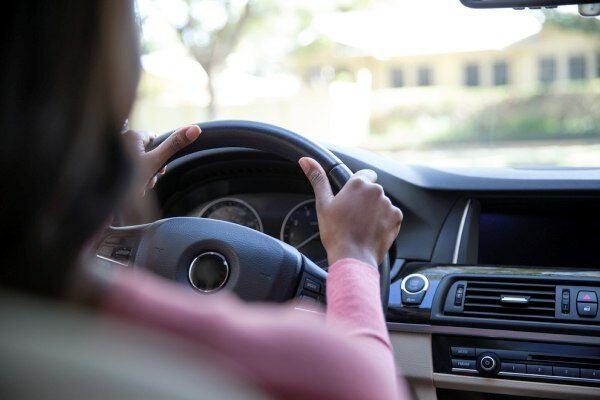 Person driving a car