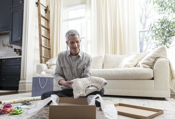 Man Opening Gift