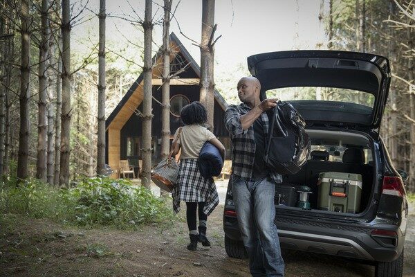 Man Unloading Car