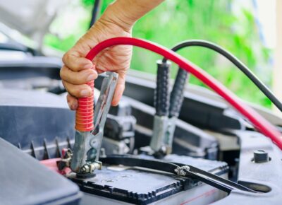 Jumper Cables on Car Battery