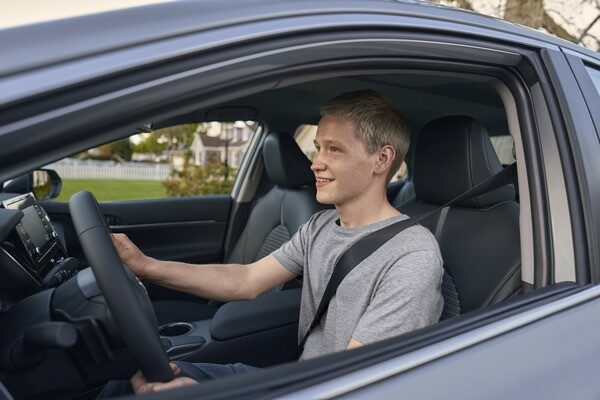 Teen Boy Driving Car