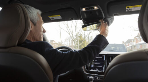 Driver looking in the rear-view mirror.