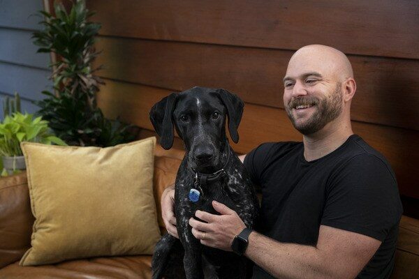 Man Holding Dog