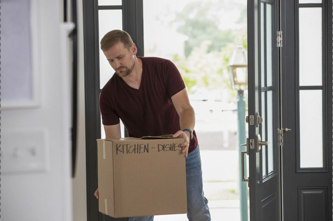 Man Carrying Moving Box