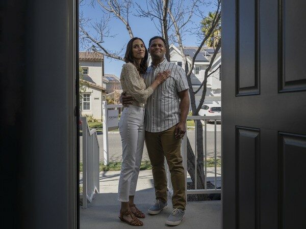 Neighbor Couple at Doorstep