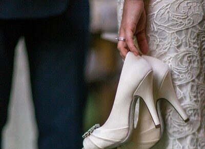 Bride Holding Shoes
