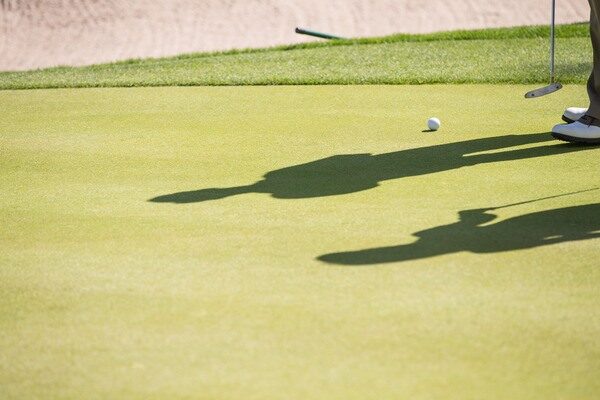 Golfers on Green