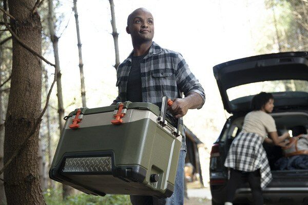 Man carrying a cooler