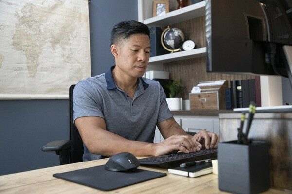 Man sitting at computer in an office