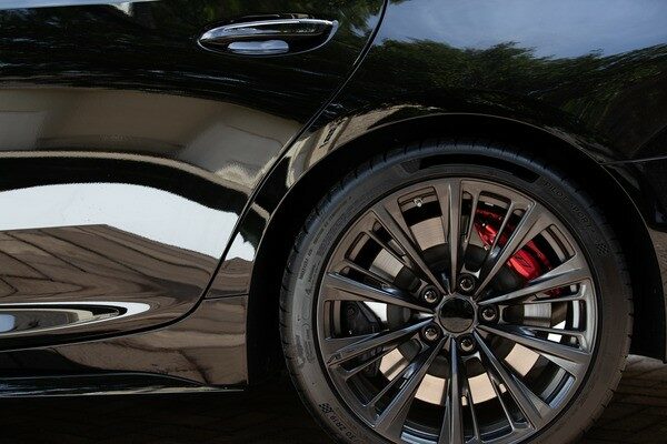 Closeup of a black car's tire