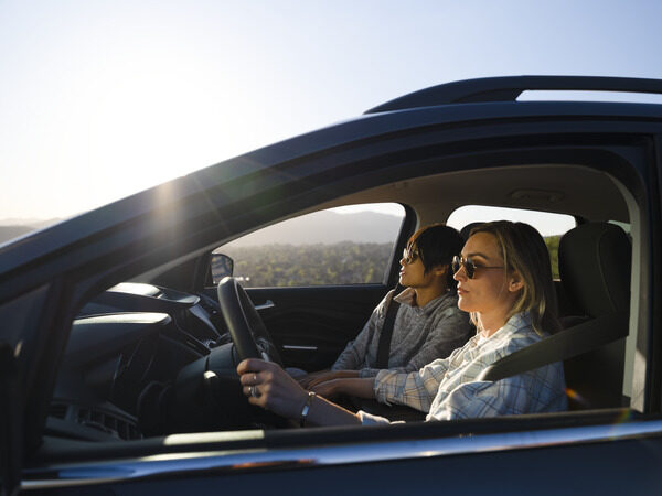 Two women in a car driving