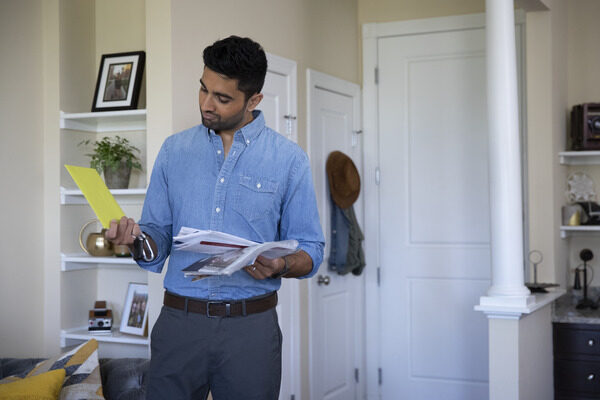 Man looking at his mail