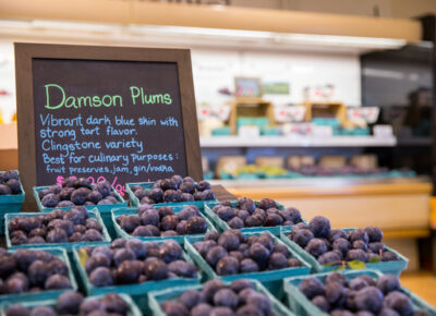Damson plums in a grocery store