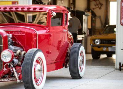 Antique red car in a garage