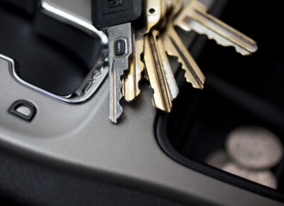 Keys sitting on a car's gear shift