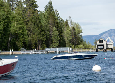 Boats sitting on a lake