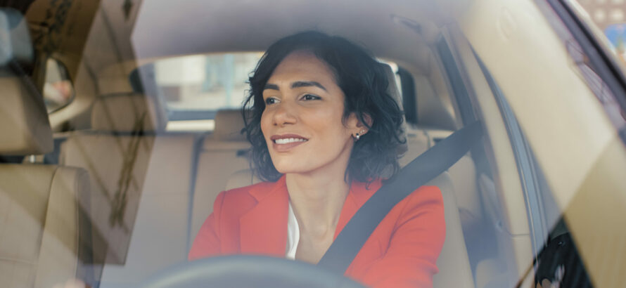 A woman behind the wheel.