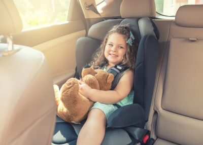 A child sitting in a car seat.